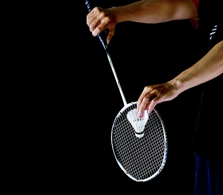 Spieler mit dem Badminton
