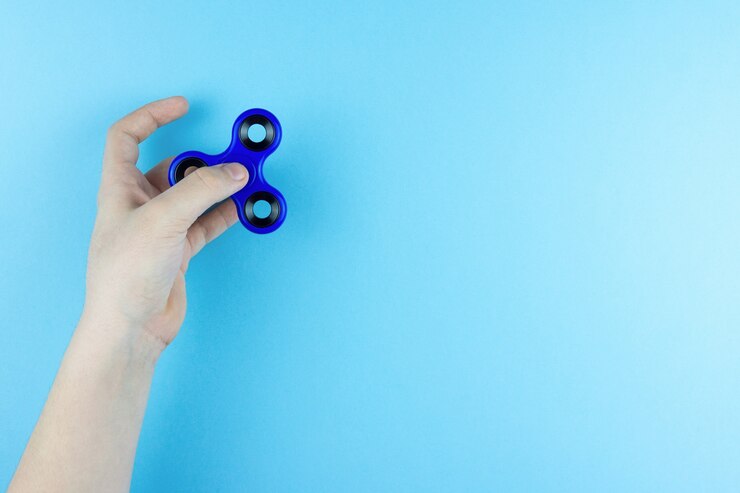 Foto spinner en mano