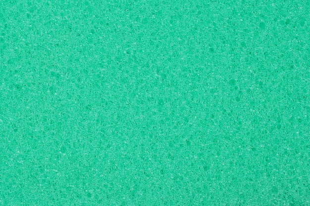 Sponge aus Zellulose-Schaum mit grüner Textur Hintergrund