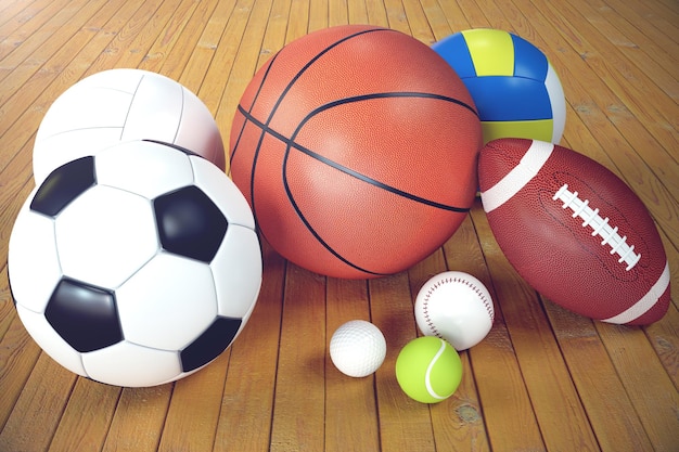 Sportbälle auf Holzhintergrund Satz Sportbälle Sportgeräte wie Fußball-Basketball-Basis