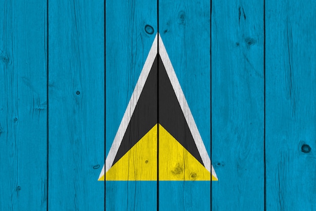 St. Lucia-Flagge gemalt auf alter hölzerner Planke