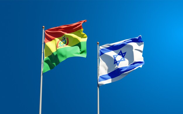 Staatsflaggen von Israel und Bolivien zusammen auf Himmelhintergrund