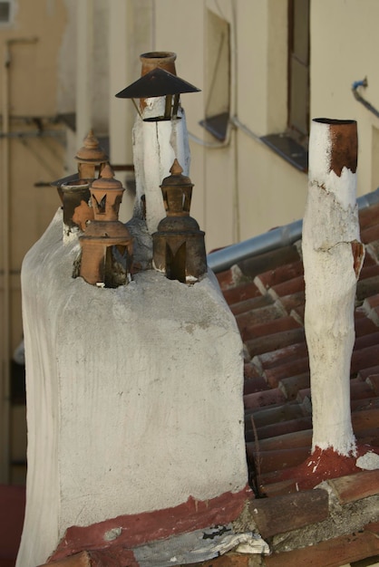 Foto stadtdächer mit tonziegelmaterial und schornsteinen