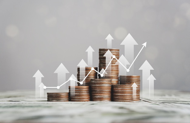 Foto stapel von silbermünzen mit handelsdiagramm in finanzkonzepten und aktienwachstum des finanzinvestitionsgeschäfts