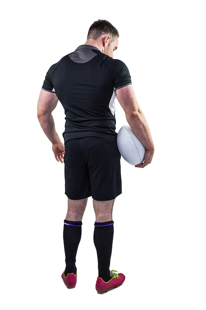 Starker Rugbyspieler, der Ball hält