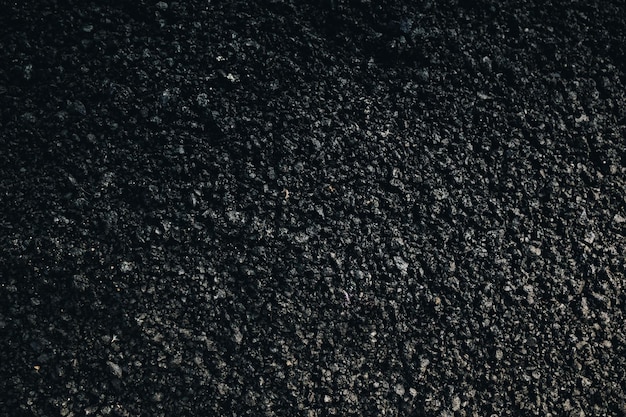 Foto stein asphalt textur hintergrund schwarzer granit kies