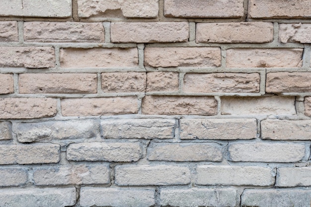Steinmauer, die alten weißen Backsteinmuster Hintergrund schnitzt