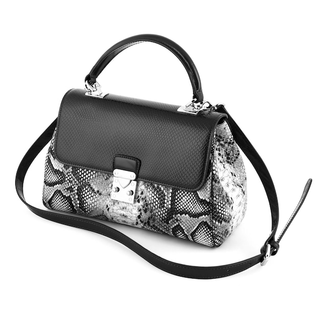 Stilvolle Damen-Accessoires Schöne Reihe von Damen-Handtasche auf weißem Hintergrund Rote schwarze und weiße Schlangenhaut-Damentasche