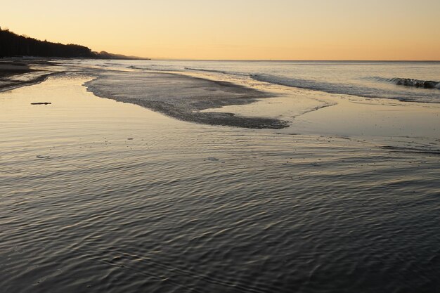 Strand bei Sonnenuntergang Ostsee Polen