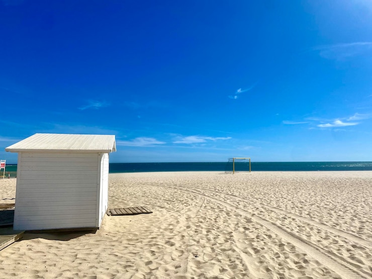 Foto strand kasten blauer himmel