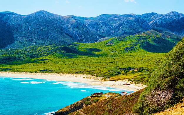 Strand von Cala Domestica im Ferienort Buggerru am Mittelmeer in der Nähe von Masua und der Provinz Cagliari in Carbonia-Iglesias, Sardinien in Italien. Landschaft und Szenerie.