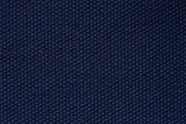 Strenge blaue Stoffstruktur für neues Interieur. Hochauflösendes Foto