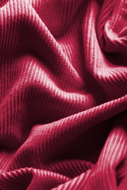 Strickwolle Textur Hintergrund. Neue Trendfarbe 2023 PANTONE 18-1750 Viva Magenta