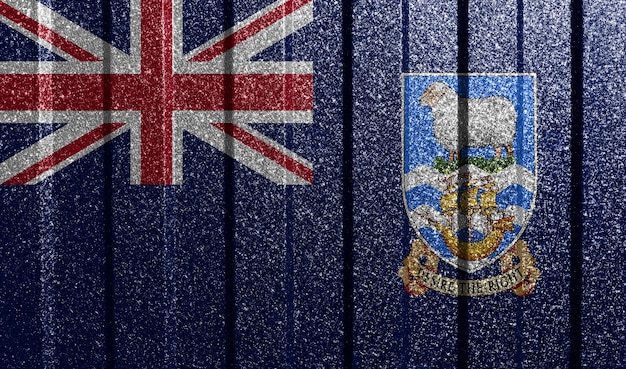 Strukturierte Flagge der Falklandinseln an der Metallwand Bunter natürlicher abstrakter geometrischer Hintergrund mit Linien