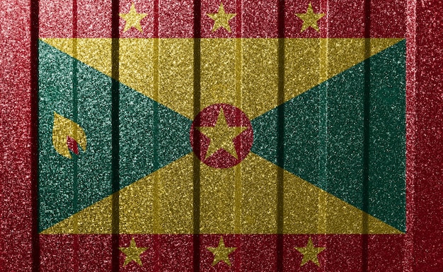 Strukturierte Flagge Grenadas an der Metallwand Bunter natürlicher abstrakter geometrischer Hintergrund mit Linien