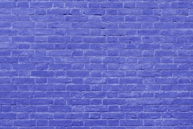 Strukturierter Hintergrund der alten blauen Backsteinmauer der Weinlese.