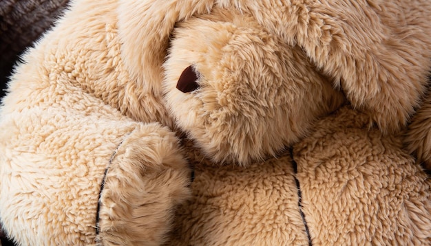 Foto un suave abrigo de piel sintética de oso de peluche closeup