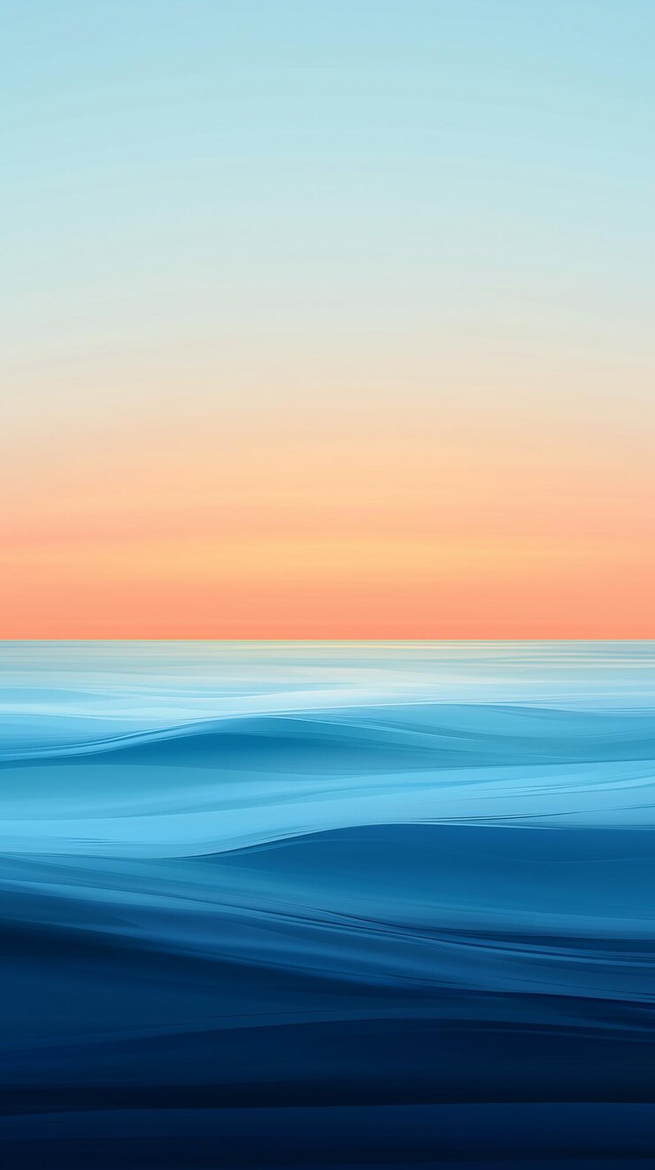 Un suave gradiente de calma azul del océano transición en un cielo claro al amanecer con olas mínimas y