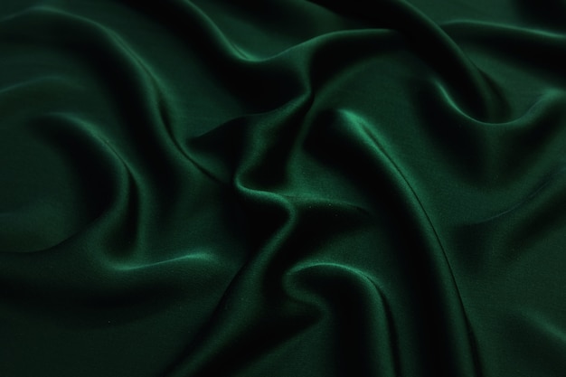 Suave seda verde elegante o textura de tela de satén de lujo