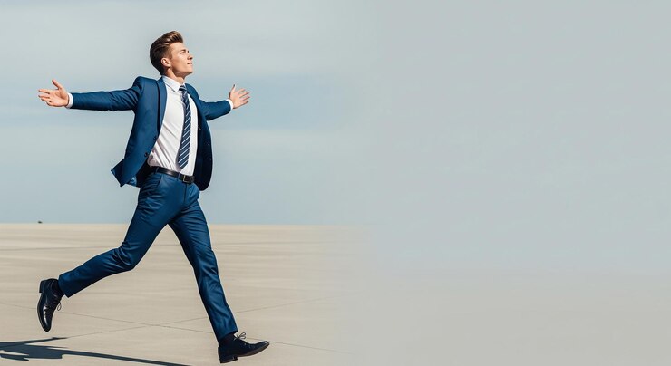 Successful Businessman Celebrating with Open Arms