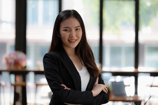 A successful organization as a manager is represented by a happy entrepreneur or businesswoman