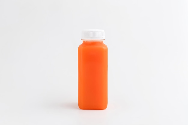 Suco de laranja na garrafa Foco seletivo