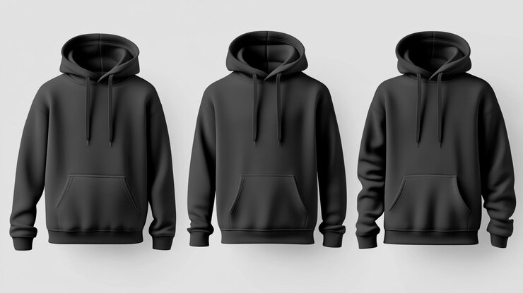 Sudaderas con capucha negras expuestas en fila sobre un fondo neutral para una vitrina de moda