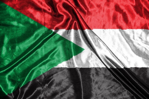 Sudan-Stoffflagge Satin-Flaggen-wehende Stoff-Textur der Flagge