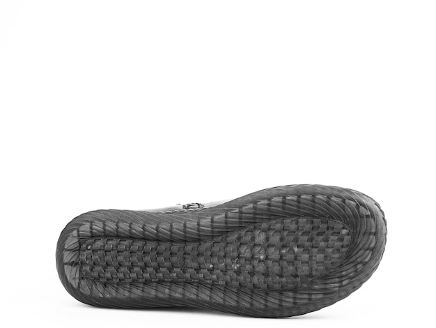 Suela para zapatos vista inferior Suela de zapato primer plano aislado sobre fondo blanco lugar para texto Elemento de botas Concepto de producción de zapatos