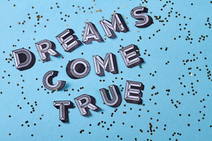 Foto los sueños se hacen realidad inscripción de letras con lentejuelas