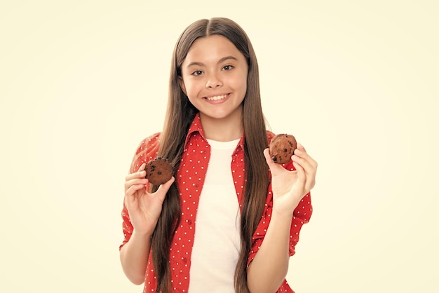 Süße Kuchen Kind mit Dessertbäckerei Porträt eines glücklich lächelnden Teenager-Mädchens, das Kekse isst