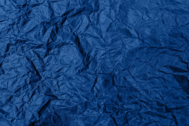 Foto sumário detalhado alto amassado fundo de textura de papel de embalagem. na cor azul.