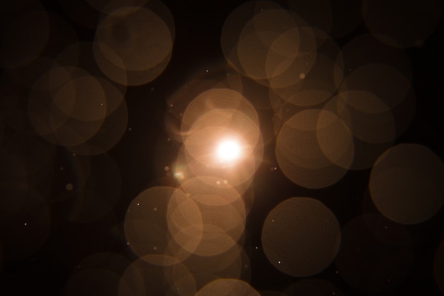 Foto sun flare en el diseño de objetos negros.