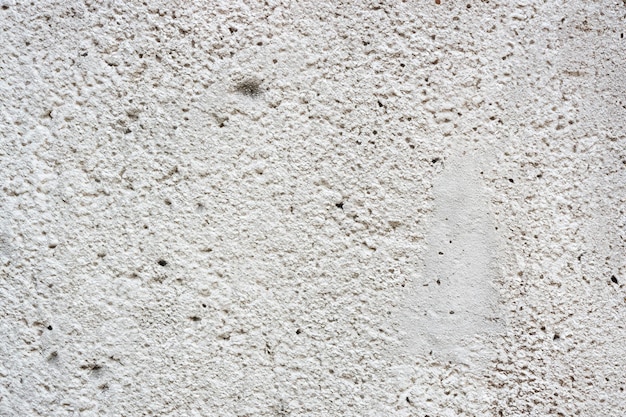 Foto superficie abstracta y texturas de pared de piedra de hormigón blanco