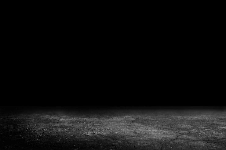 Foto superficie de asfalto, pista de carreras en un fondo negro