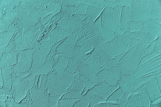 Foto superfície áspera de parede pintada de azul
