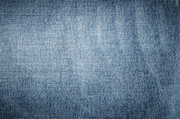 Superficie azul abstracta del dril de algodón para el fondo, pantalones vaqueros Indigo para el diseño