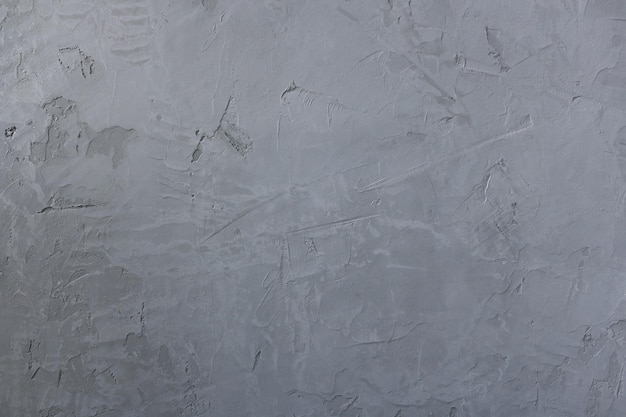 Superficie en blanco gris de un muro de hormigón con fondo de diseño abstracto de yeso con textura fina