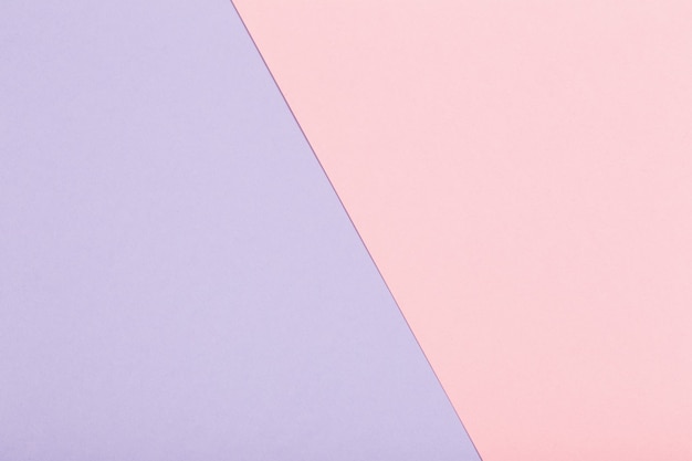 superfície de folhas de papel rosa e violeta pastel