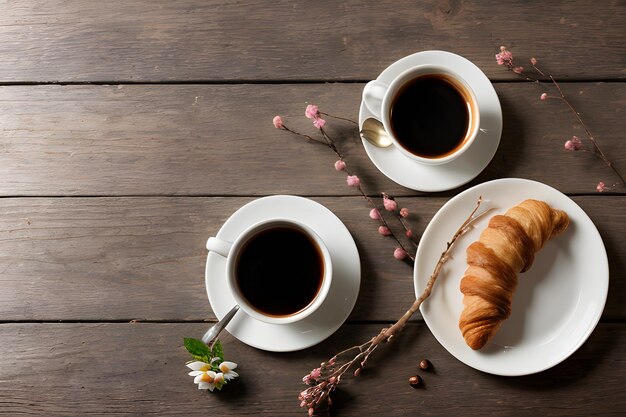 superfície de madeira com galhos decorativos Café com croissant e flores