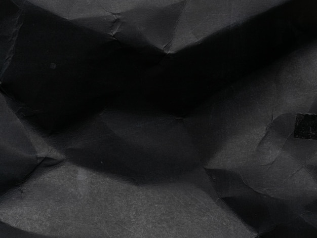 Superfície de papelão preto amassado Padrão de fundo de papel antigo Textura áspera e espaço de cópia