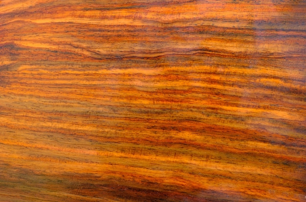 Superficie de fondo de textura de madera de palisandro siamés con patrón natural