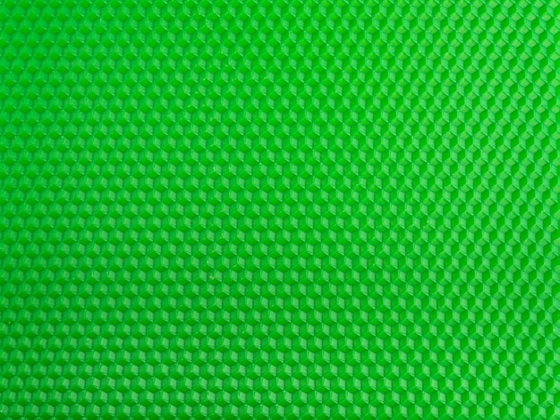 Foto superficie futurista. fondo de panal geométrico verde brillante. plantilla.