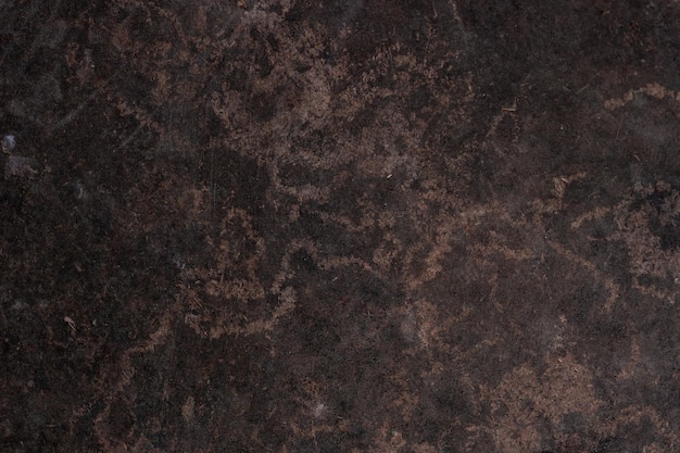 superficie de hierro oxidado con pintura marrón vieja como fondo