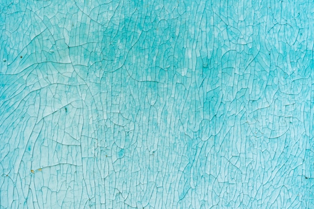 Superfície inoxidável velha e enferrujada com pintura rachada, fundos abstratos