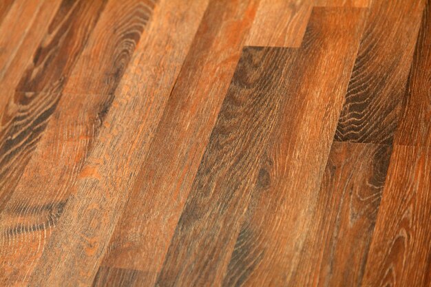 Superfície macia diferente da madeira como o fundo, textura de madeira. Parede de madeira. Close-up de uma ampla gama de laminado em cores diferentes.