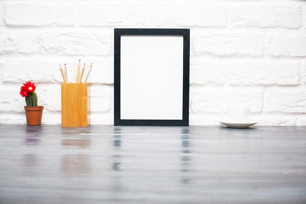 Foto superficie de madera con marco en blanco