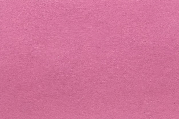 Superficie de la pared de cemento rosa.