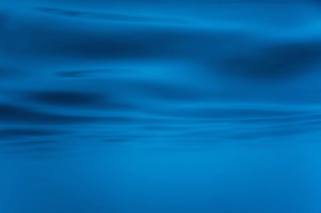 Superficie submarina del mar, fondo azul, fondo de ondas