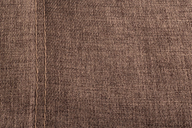 Superfície têxtil com costura Fundo marrom texturizado